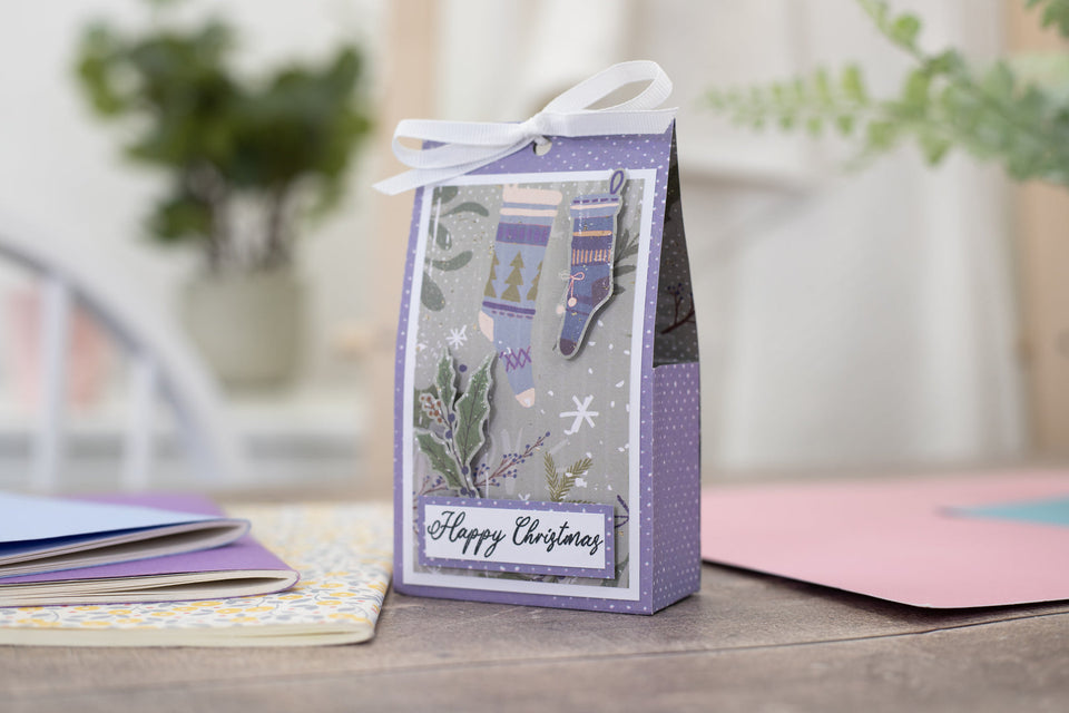 Create a papercraft Christmas gift bag